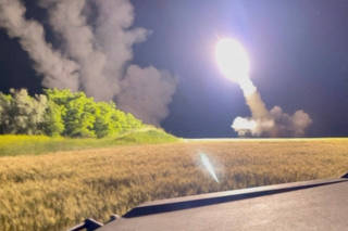 FILE PHOTO: A view shows a M142 High Mobility Artillery Rocket System (HIMARS) is being fired in an undisclosed location