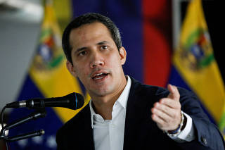 FILE PHOTO: Venezuela's opposition leader Juan Guaido addresses the media in Caracas