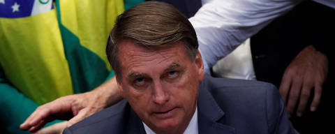 Brazil's President Jair Bolsonaro looks on during the national convention of the Progressive Party, in Brasilia, Brazil July 27, 2022. REUTERS/Adriano Machado ORG XMIT: GGGAHM11