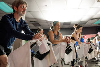 A spin class in the Brooklyn neighborhood of New York, April 24, 2018. (George Etheredge/The New York Times)