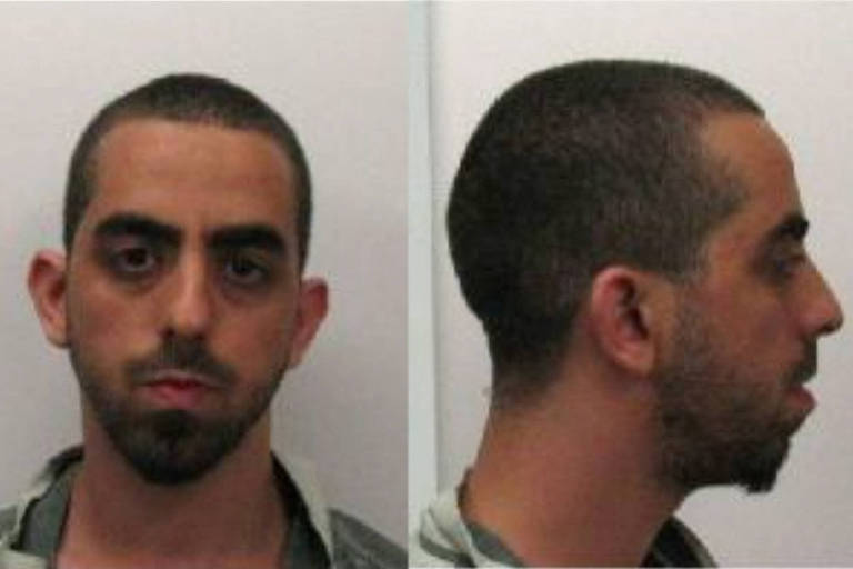Hadi Matar of Fairview, New Jersey, who pleaded not guilty to charges of attempted murder and assault of acclaimed author Salman Rushdie, appears in booking photographs at Chautauqua County Jail in Mayville, New York, U.S. August 12, 2022. Chautauqua County Jail/Handout via REUTERS.  THIS IMAGE HAS BEEN SUPPLIED BY A THIRD PARTY.