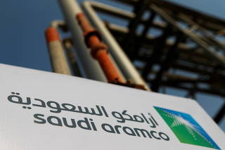 FILE PHOTO: Saudi Aramco logo is pictured at the oil facility in Abqaiq
