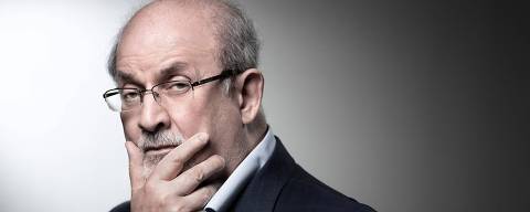 (FILES) In this file photo taken on September 10, 2018, British novelist and essayist Salman Rushdie poses during a photo session in Paris. - Salman Rushdie, who spent years in hiding after an Iranian fatwa ordered his killing, was on a ventilator and could lose an eye following a stabbing attack at a literary event in New York state on August 11, 2022. (Photo by JOEL SAGET / AFP) ORG XMIT: 26982