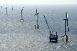 Windmills of the wind farm BARD Offshore 1, are pictured 100 kilometres north-west of the German island of Borkum