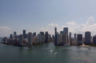 The Miami River flows into Biscayne Bay between Brickell neighborhood and Downtown, in Miami