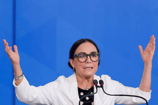 New Brazil's Culture Secretary Regina Duarte gestures during her inauguration ceremony at the Planalto Palace, in Brasilia