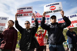 Demonstrators in Boston on Oct. 14, 2018 supported a lawsuit accusing Harvard of discrimination against Asian Americans in its admissions decisions. (Kayana Szymczak/The New York Times)