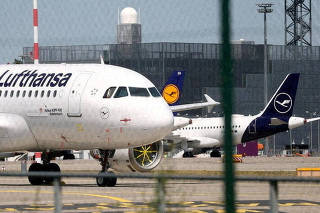 FILE PHOTO: Planes of German air carrier Lufthansa are parked at Frankfurt airport
