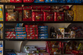 Nestl products line the shelves of a pharmacy in Muana, Brazil.