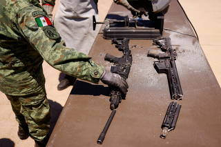 Weapons seized from criminal gangs are destroyed by military personnel at a military base in Ciudad Juarez
