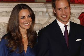 Britain's Prince William and his fiancee Kate Middleton pose for a photograph in St. James's Palace in central London