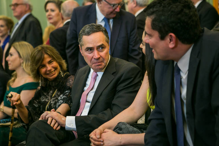 O ministro do STF, Luís Roberto Barroso, e Sergio Moro, em cerimônia na Academia Brasileira de Letras 
