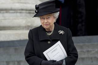 Britain's Queen Elizabeth leaves after attending the funeral service for former British prime minister, Margaret Thatcher, at Saint Paul's Cathedral, in London