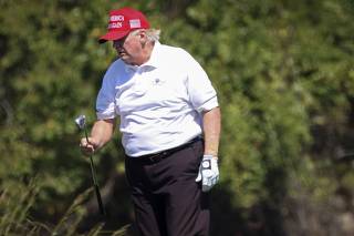 Former President Trump Golfs At Trump National Golf Course In Sterling, Virginia