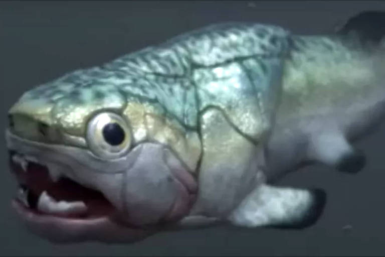 Ilustração em 3D do peixe Gogo. Ele tem escamas verdes e está com a boca aberta.