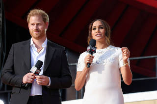 FILE PHOTO: Britain's Prince Harry and Meghan Markle speak at the 2021 Global Citizen Live concert at Central Park in New York