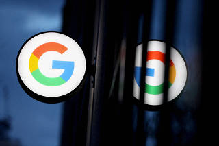FILE PHOTO: FILE PHOTO: The logo for Google LLC is seen at the Google Store Chelsea in Manhattan, New York City, U.S.