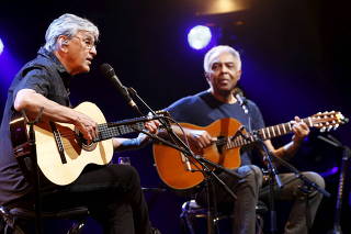 FILE PHOTO: Brazilian musicians Veloso and Gil perform their 