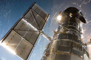 FILE PHOTO: An STS-125 crewmember onboard the Space Shuttle Atlantis snapped this still photo of the Hubble Space Telescope