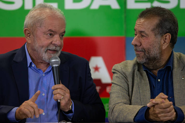 O ex-presidente Lula ao lado de Carlos Lupi