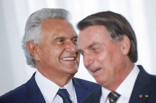 Governor of the Goias state Ronaldo Caiado state and Brazil's President and candidate for re-election Jair Bolsonaro attend a meeting with elected parliamentarians and governors who support Bolsonaro at the Alvorada Palace in Brasilia