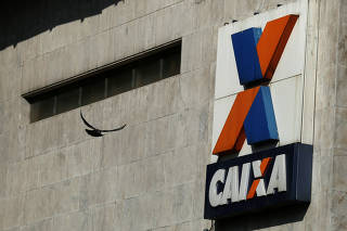 FILE PHOTO: A view shows the company logo of Caixa Economica Federal bank in downtown Rio de Janeiro