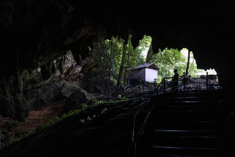 The entrance to the Tham Luang Cave in Chiang Rai province, Thailand, on Aug. 17, 2022. The rescue of 12 boys and their soccer coach trapped in the cave in 2018 has since become the focus of documentary films and Hollywood blockbusters. (Luke Duggleby/The New York Times)