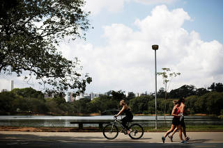 Citizens do exercise at Ibirapuera Park in Sao Paulo