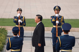 China's President Xi Jinping attends a wreath laying ceremony on Tiananmen Square to mark Martyrs' Day, in Beijing