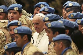 Pope Francis is pictured with UN soldiers during his Wednesday general audience in Paul VI hall at the Vatican