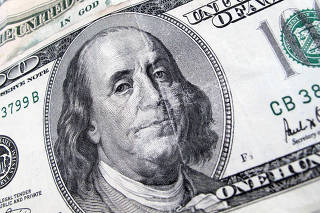 FILE PHOTO: A U.S. $100 dollar bill is seen
