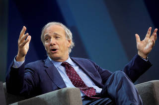FILE PHOTO: Dalio, co-chairman and co-chief investment officer of hedge fund Bridgewater, speaks in New York