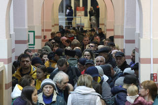 Civilians evacuated from the Russian-controlled Kherson region of Ukraine arrive in Dzhankoi