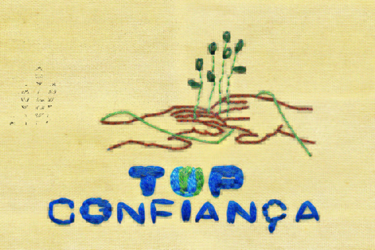 Bordado escrito Top Confiança, letras azuis, desenho de duas mãos se tocando e uma planta crescendo em volta delas. Ilustração para a revista Top of Mind 2022