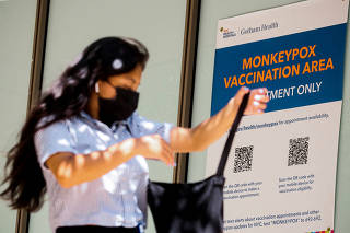 FILE PHOTO: A woman arrives at a monkeypox vaccination site in New York
