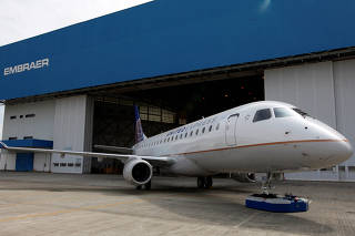 FILE PHOTO: Brazilian aircraft manufacturer Embraer unveils its new regional jet E-175, in Sao Jose dos Campos