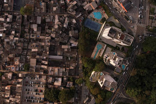 An aerial view shows Paraisopolis slum and buildings from Morumbi neighbourhood in Sao Paulo