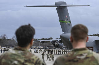 U.S. Army soldiers deploy toÊNATO countriesÊin eastern Europe at Fort Bragg, N.C., on Thursday Feb. 3, 2022. (Kenny Holston/The New York Times)