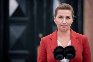 Denmark's Prime Minister Mette Frederiksen speaks during a news conference in front of Marienborg