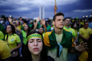 Evangelical supporters of Brazil's President Jair Bolsonaro attend a campaign rally, in Brasilia