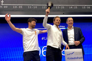 Berlin medicinal cannabis supplier start-up Cantourage team ring the opening bell after getting listed at the stock exchange in Frankfurt
