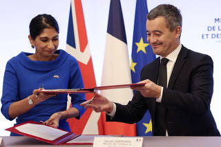 British Home Secretary Suella Braverman signs a historic deal with the French Interior Minister Gerald Darmanin, in Paris