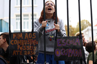 Climate change activists protest against the use of fossil fuels in Lisbon