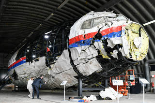 FILE PHOTO: Judges inspect reconstruction of MH17 wreckage, in Reijen