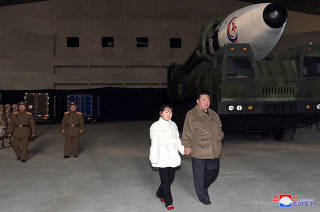 North Korean leader Kim Jong Un inspects an intercontinental ballistic missile (ICBM)