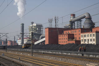 Coal at an industrial park in Jiexiu, a city in the central part of Shanxi province, China, Oct. 22, 2022. (Gilles Sabrié/The New York Times)