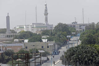 FILE PHOTO: A general view shows a deserted street in front of the Presidential palace in Mogadishu