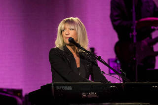 Christine McVie on keyboards with Fleetwood Mac, performing at Madison Square Garden in New York.