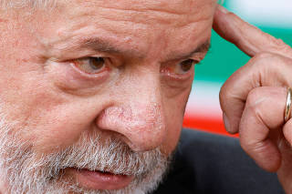Brazilian President-elect Luiz Inacio Lula da Silva attends a news conference in Brasilia