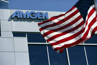 FILE PHOTO: An Amgen sign at the company's office in South San Francisco